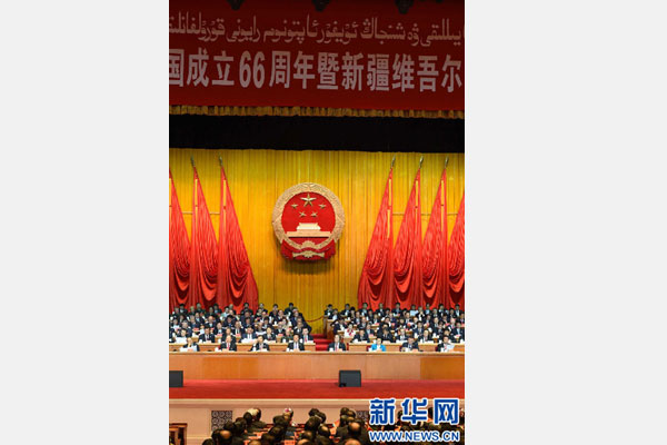 10月1日，慶祝中華人民共和國(guó)成立66周年暨新疆維吾爾自治區(qū)成立60周年大會(huì)在新疆人民會(huì)堂隆重舉行。 新華社記者 高潔 攝 