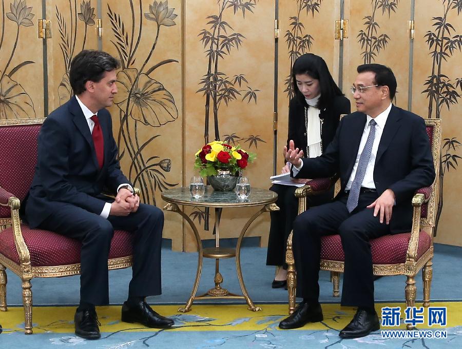 6月18日，國(guó)務(wù)院總理李克強(qiáng)在倫敦會(huì)見(jiàn)英國(guó)工黨領(lǐng)袖埃德·米利班德。新華社記者 龐興雷 攝