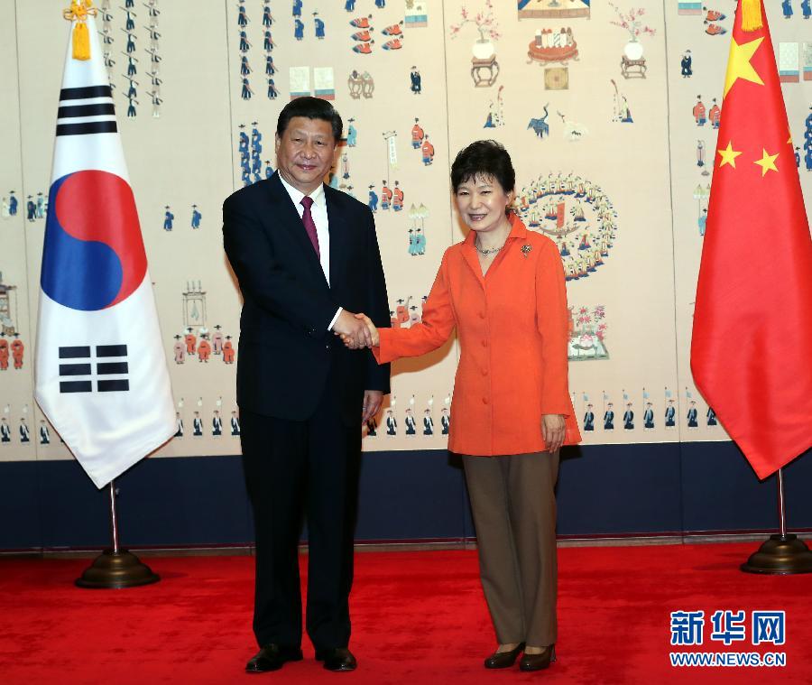 7月3日，國家主席習(xí)近平在首爾同韓國總統(tǒng)樸槿惠舉行會(huì)談。新華社記者 蘭紅光 攝