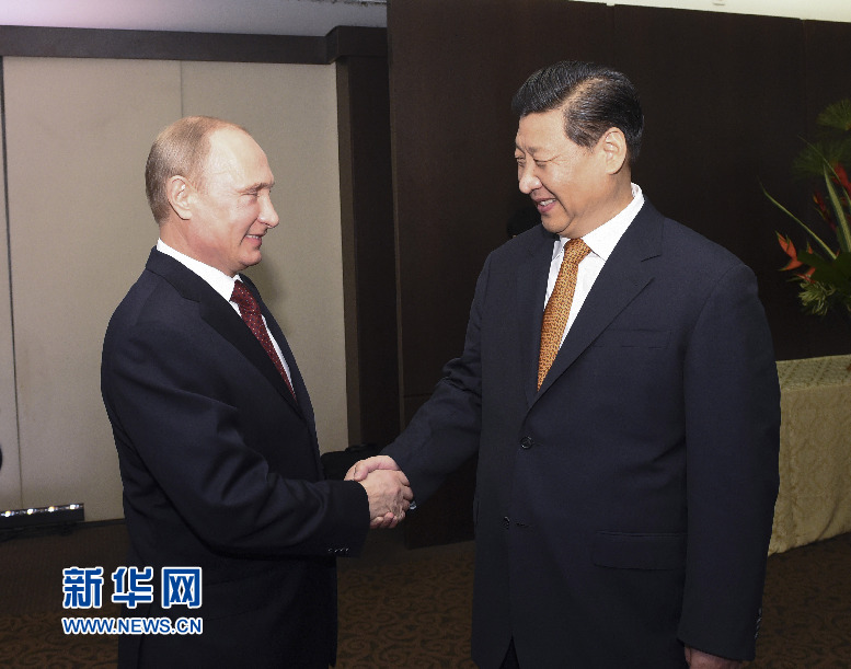 7月14日，國家主席習(xí)近平在巴西福塔萊薩會見俄羅斯總統(tǒng)普京。新華社記者李學(xué)仁攝