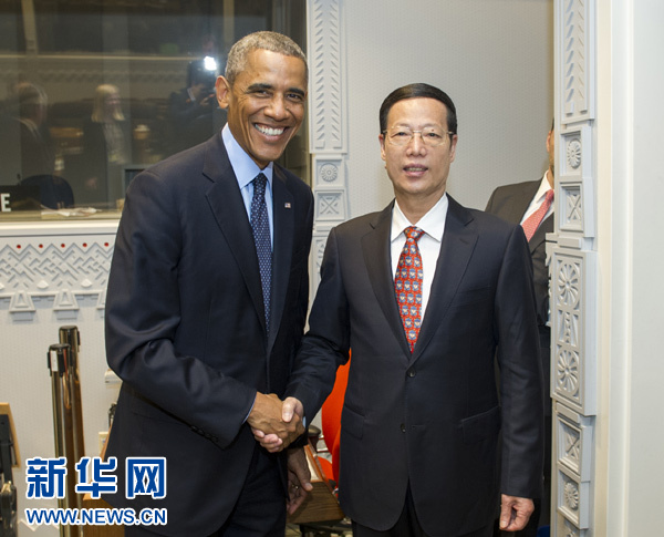 9月23日，國家主席習(xí)近平特使、國務(wù)院副總理張高麗在紐約會見出席聯(lián)合國氣候峰會的美國總統(tǒng)奧巴馬。 新華社記者王曄攝
