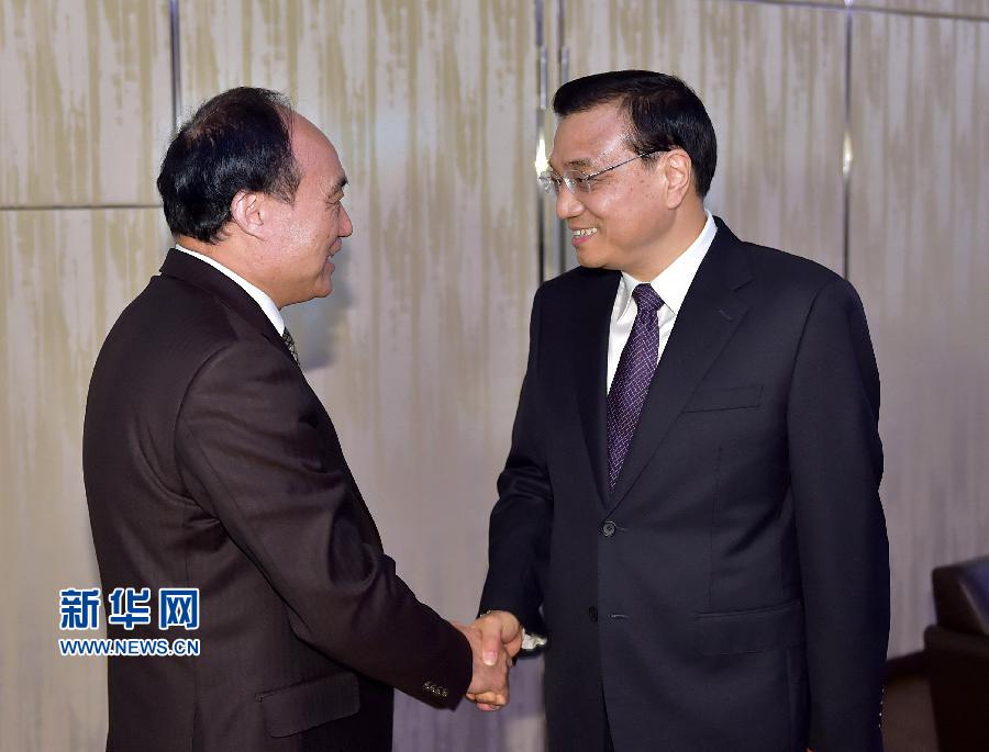 1月22日，中國國務(wù)院總理李克強在瑞士蘇黎世會見國際電信聯(lián)盟秘書長趙厚麟。 新華社記者 李濤 攝 

