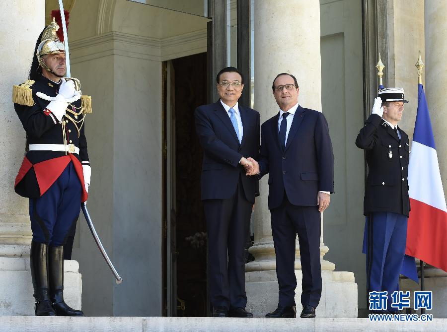 當?shù)貢r間6月30日下午，國務院總理李克強在巴黎愛麗舍宮會見法國總統(tǒng)奧朗德。 新華社記者李學仁攝