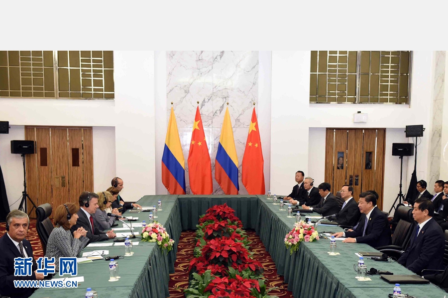 11月18日，國(guó)家主席習(xí)近平在菲律賓馬尼拉會(huì)見哥倫比亞總統(tǒng)桑托斯。 新華社記者 饒愛民 攝