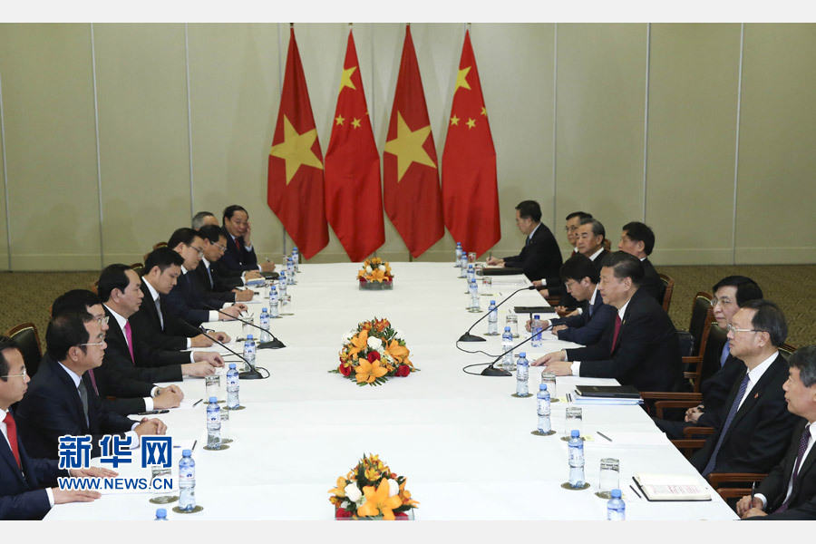 11月19日，國家主席習近平在利馬會見越南國家主席陳大光。新華社記者 龐興雷 攝 